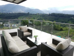 Amplio apartamento con terrazas y vista única cafetera